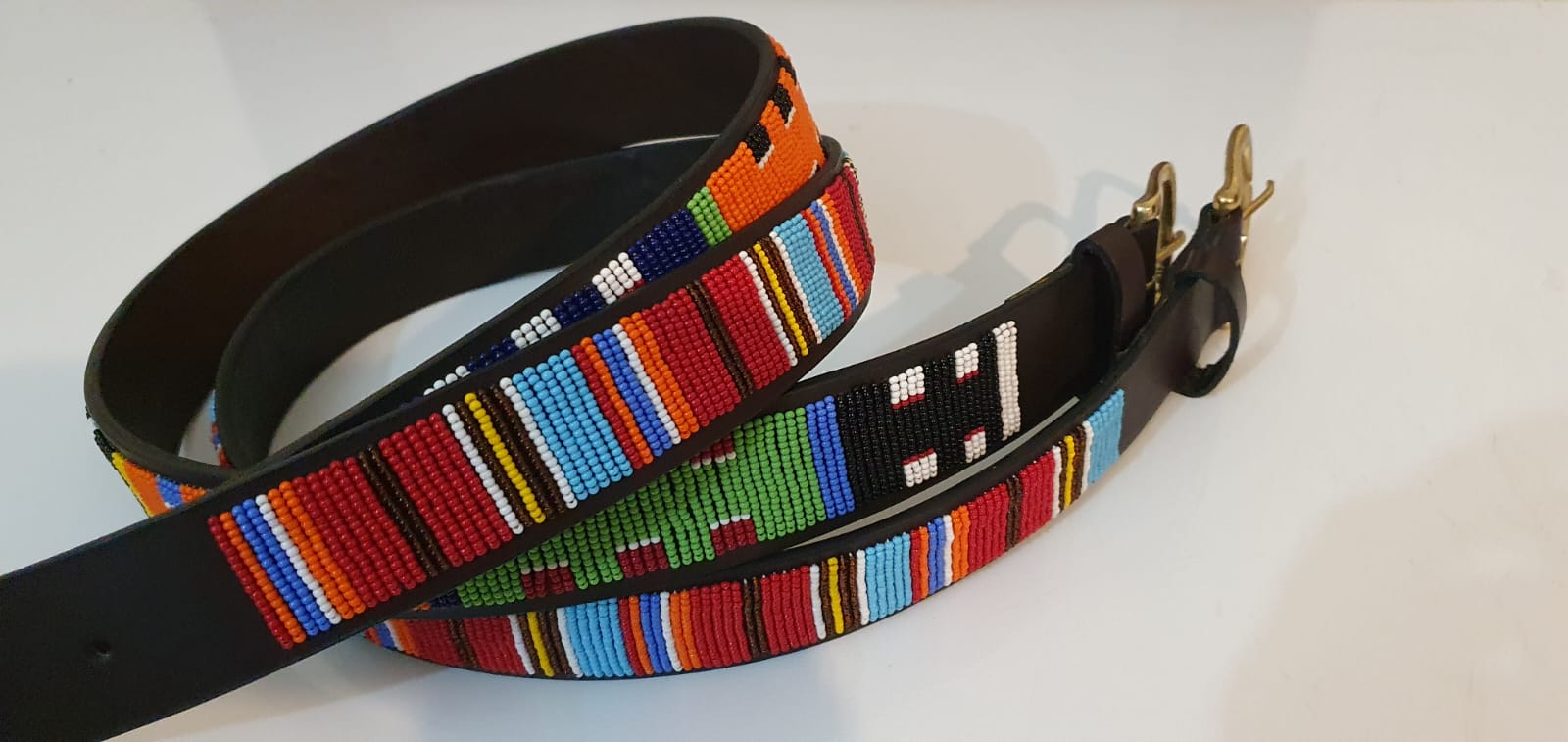 Leather belts with beaded patterns