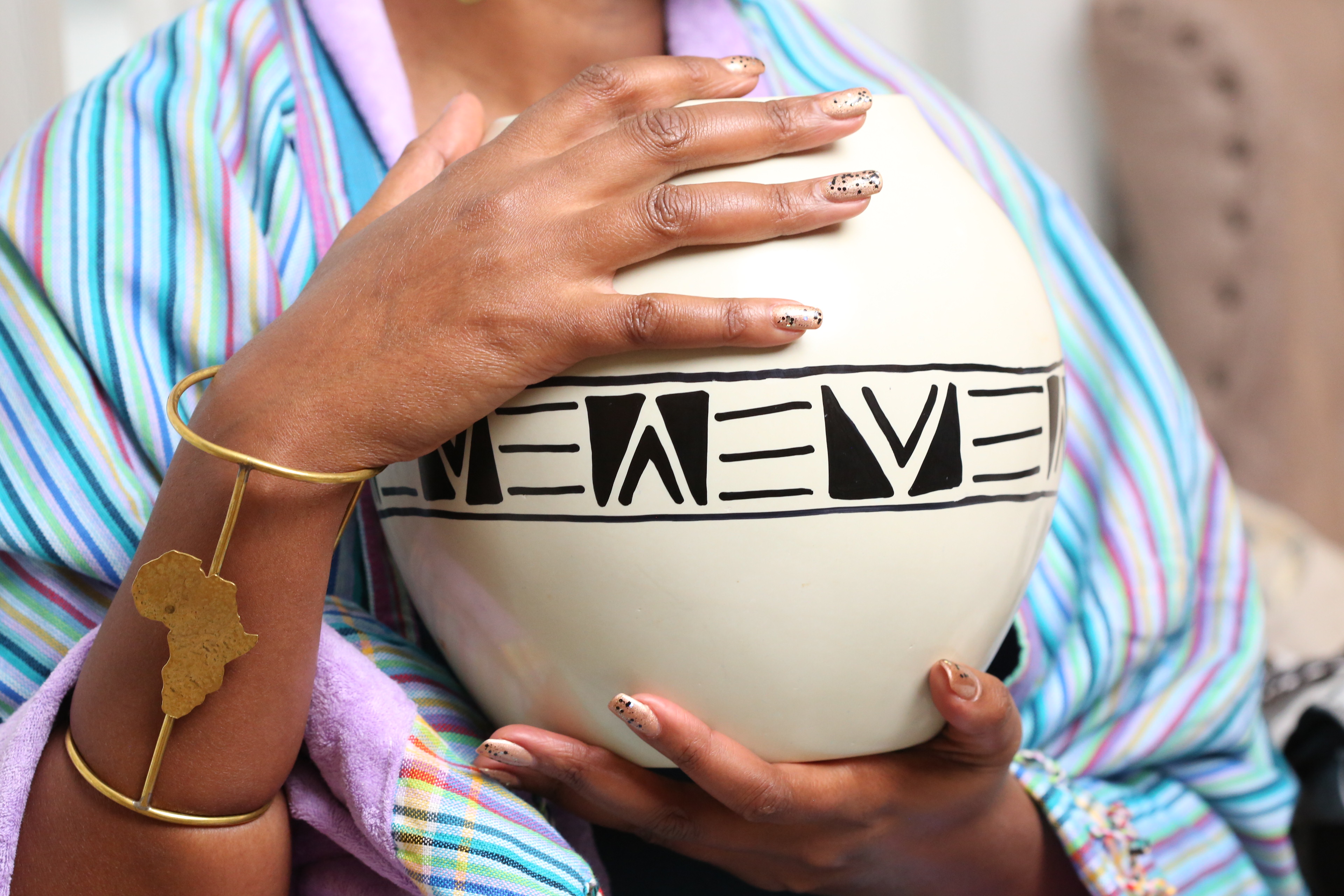 Elegant circular soapstone white vase.