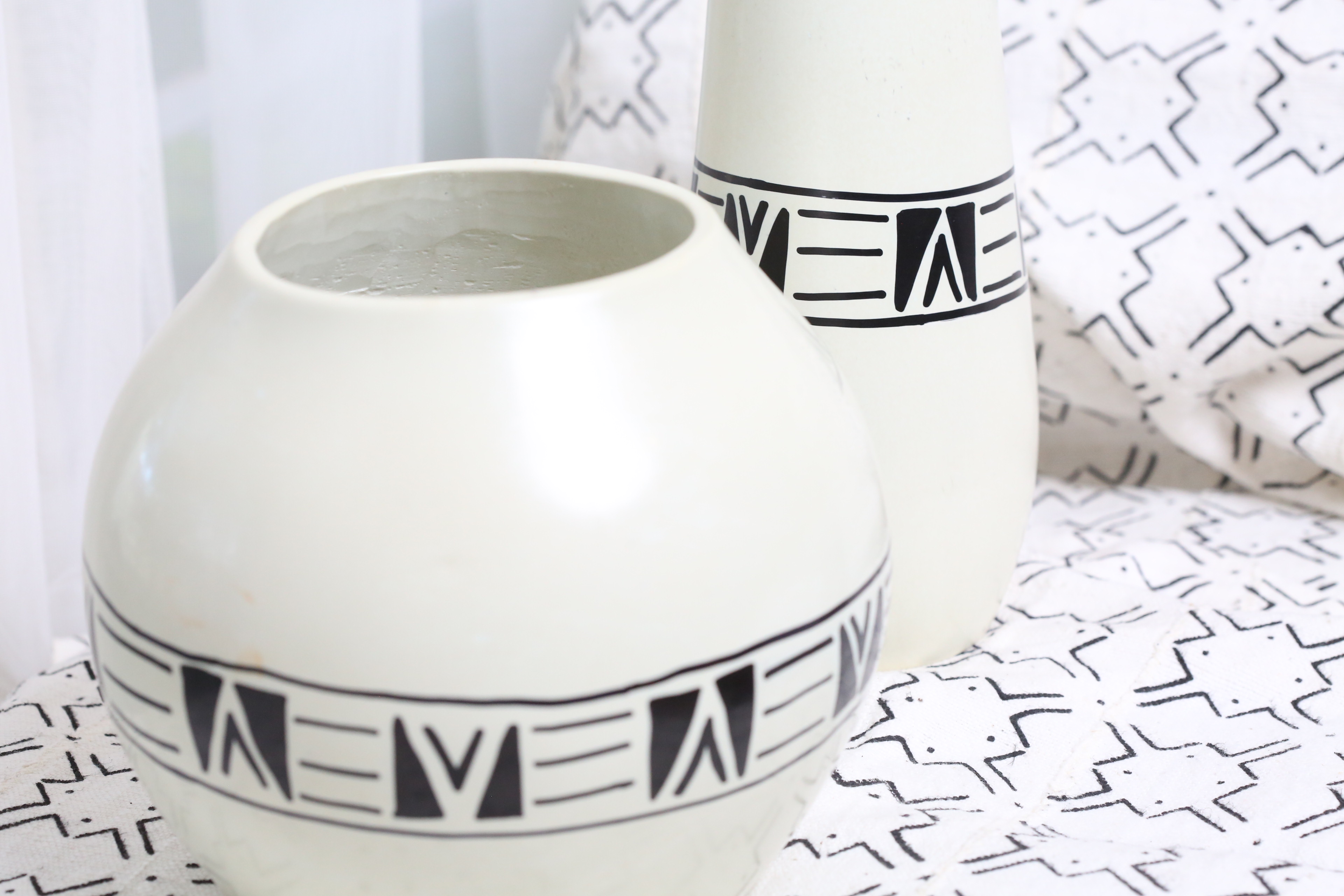 Elegant circular soapstone white vase.