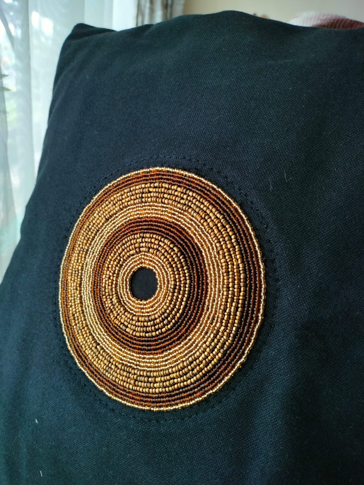 Black linen throw cover with beads