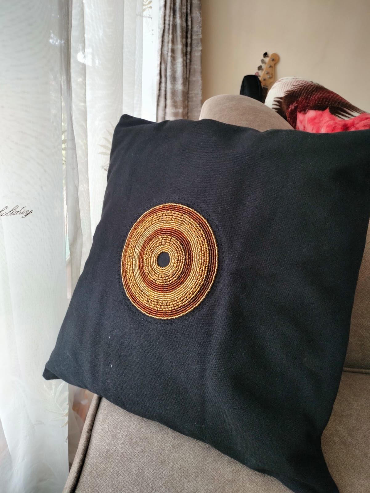 Black linen throw cover with beads