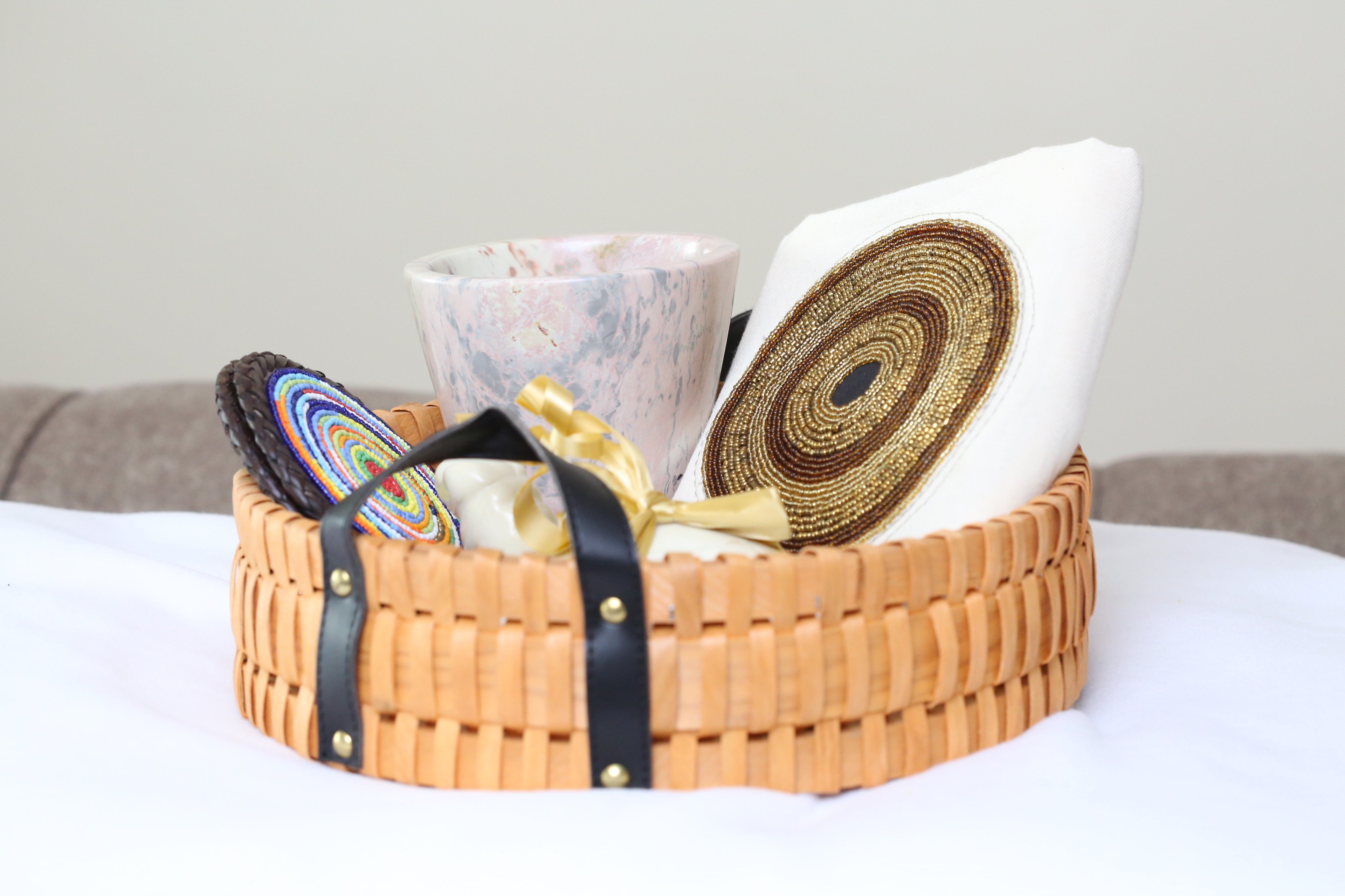 Basket with  Maasai beaded coasters and pillow cover gift package