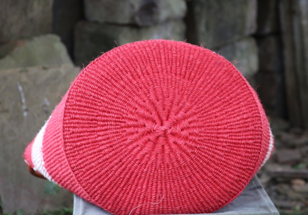 Red and off-white in the middle with handles (different variations), Kiondo baskets