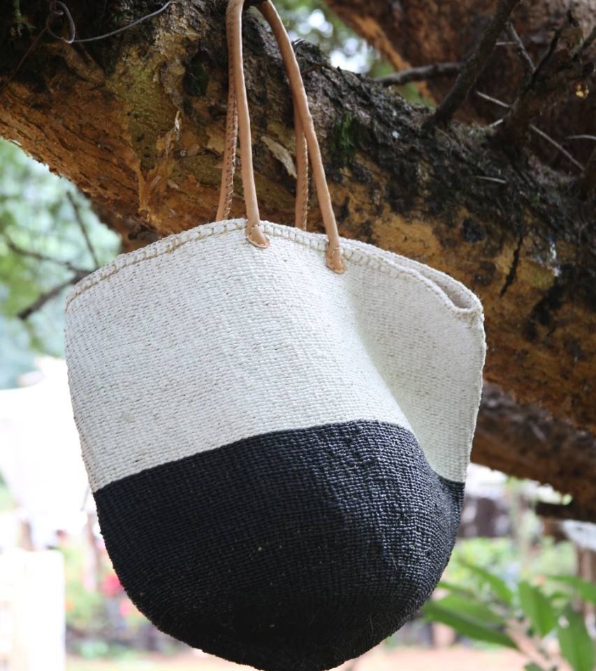 Large white with black bottom carrying basket