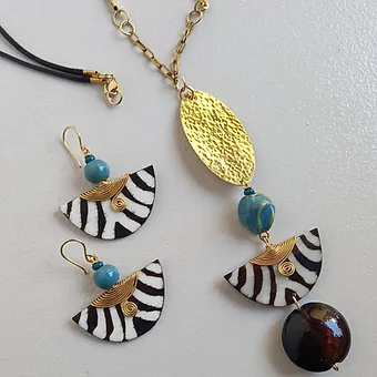 Golden glow brass with blue beads necklace